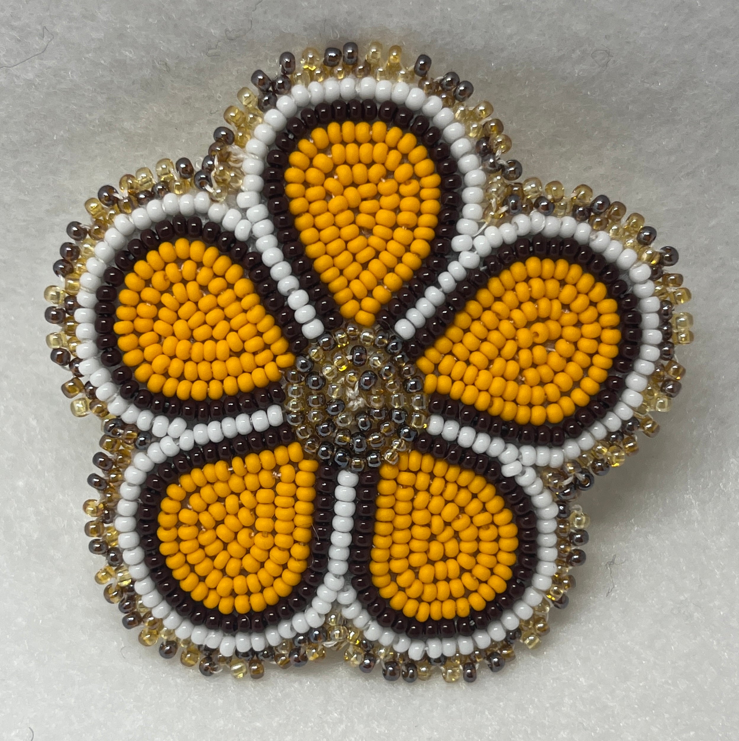 Brandon Swain Novlesky Yellow Flower Pin with Topaz Mix Center
